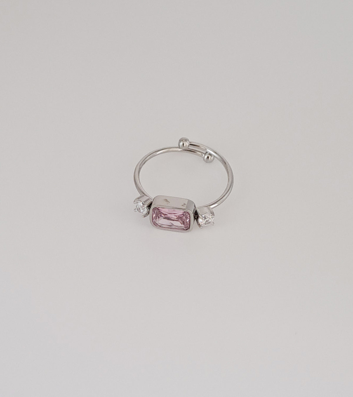 Anel Ajustável Prateado Adornado com Pedra Rosa em Cristal e Zircónias