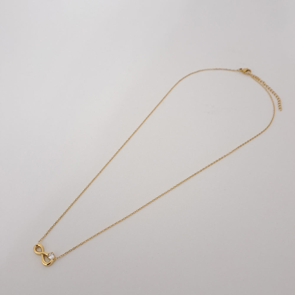 Colar dourado com símbolo infinito e zircónias, aço inoxidável delicado