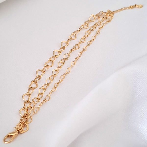 Pulseira Tripla Banhada a Ouro 18k, com Elos de Corações Vazados Lisos